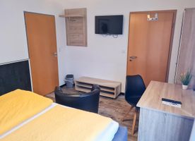 Doppel- und Einzelzimmer